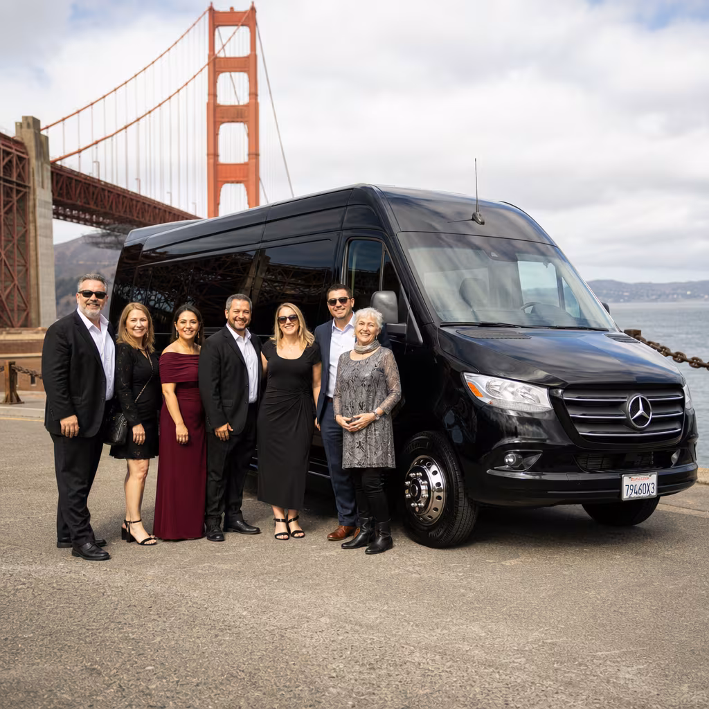 Group beside a Mercedes Sprinter limo from the San Francisco fleet at the beach