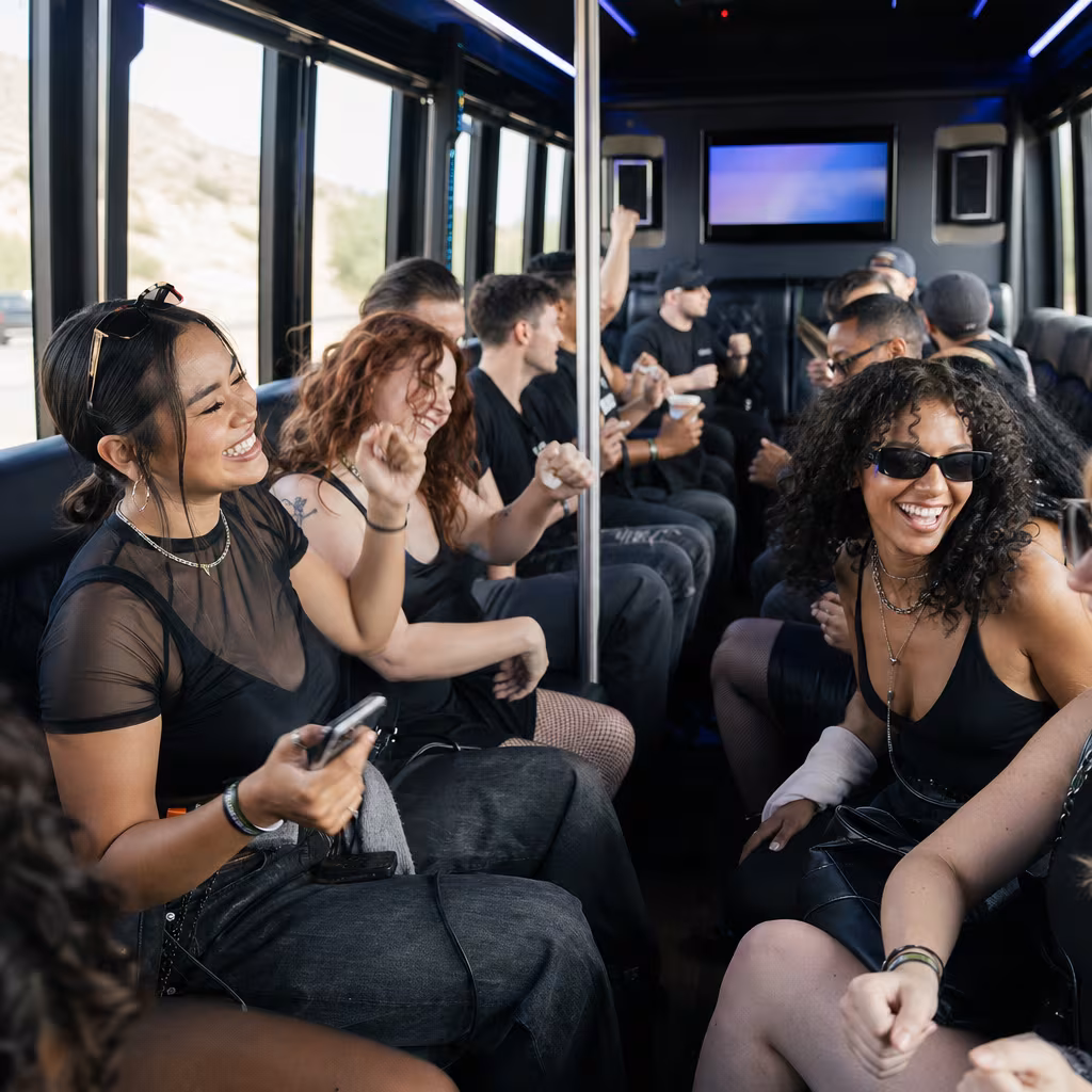Passengers loading luggage while boarding an San Francisco group shuttle