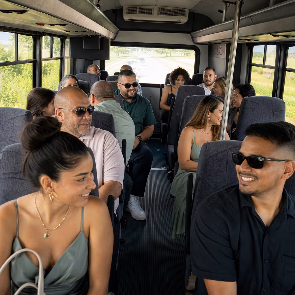 Group boarding a white charter bus for Private Event Transportation transportation in San Francisco