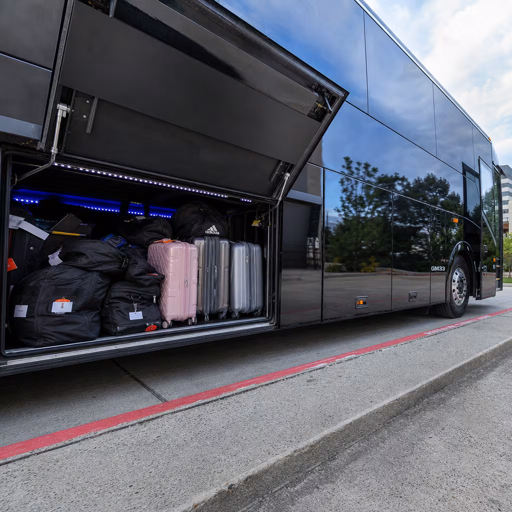 Party bus interior with wraparound leather seating and LED lighting in San Francisco