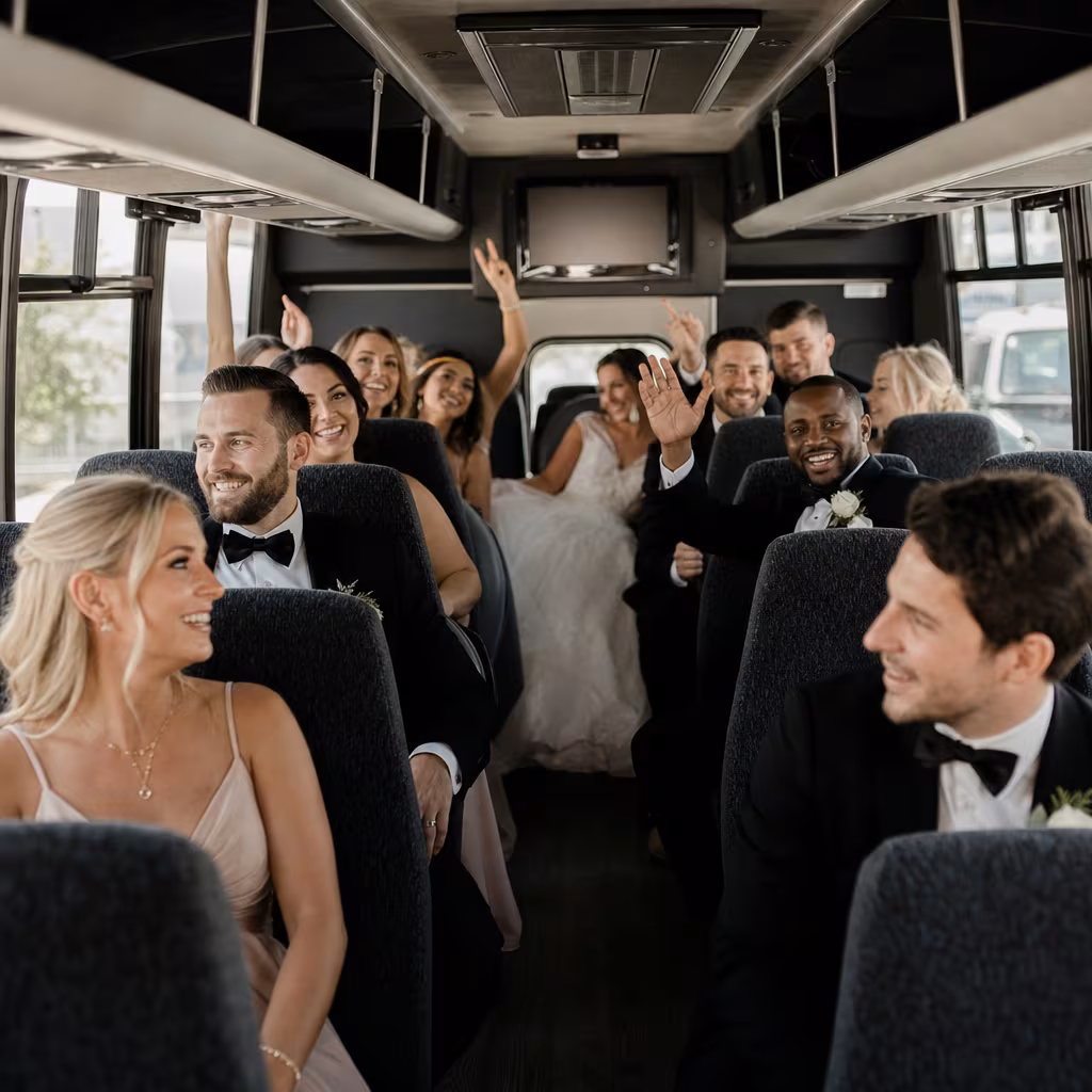 Group boarding a white charter bus for Wedding Transportation transportation in San Francisco
