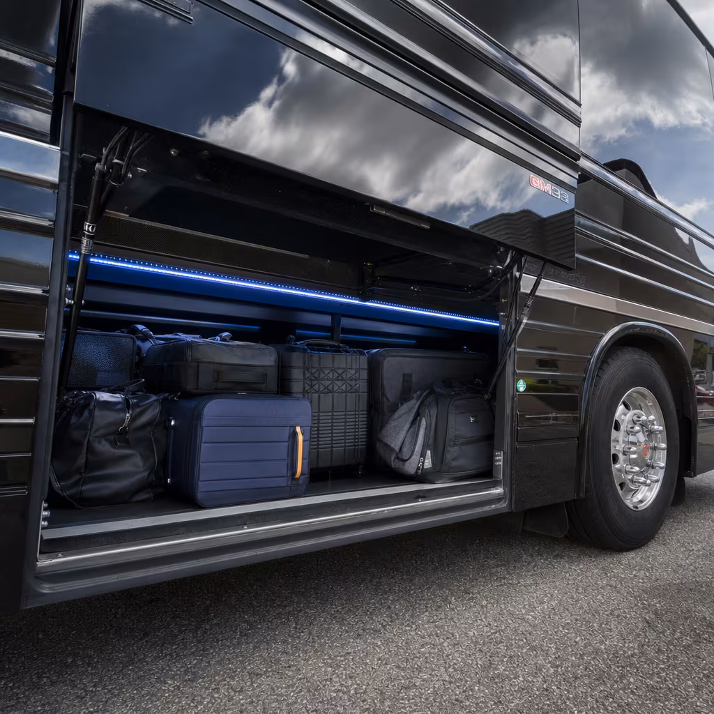 Party bus interior with wraparound leather seating and LED lighting in San Francisco